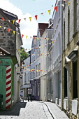 Guernsey, St Peter Port : Mill Street. Once trendy, today a shadow of its former self